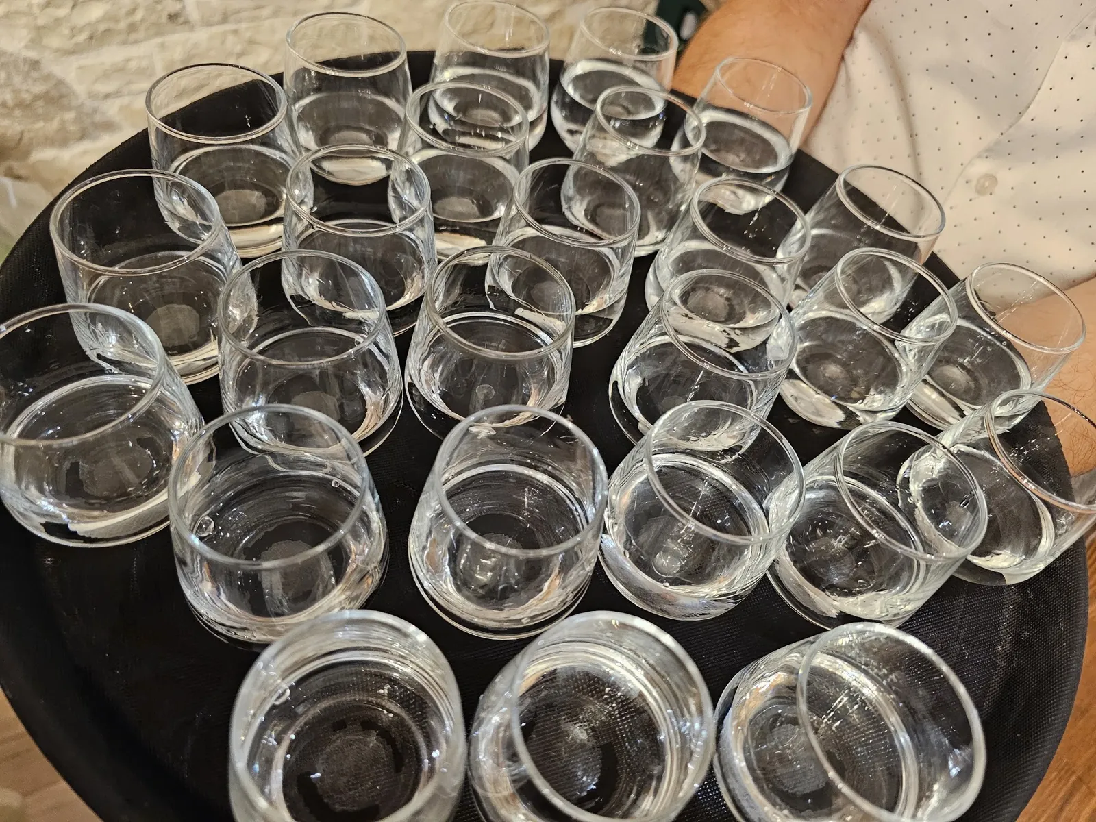 A tray of small glasses, ready for the table